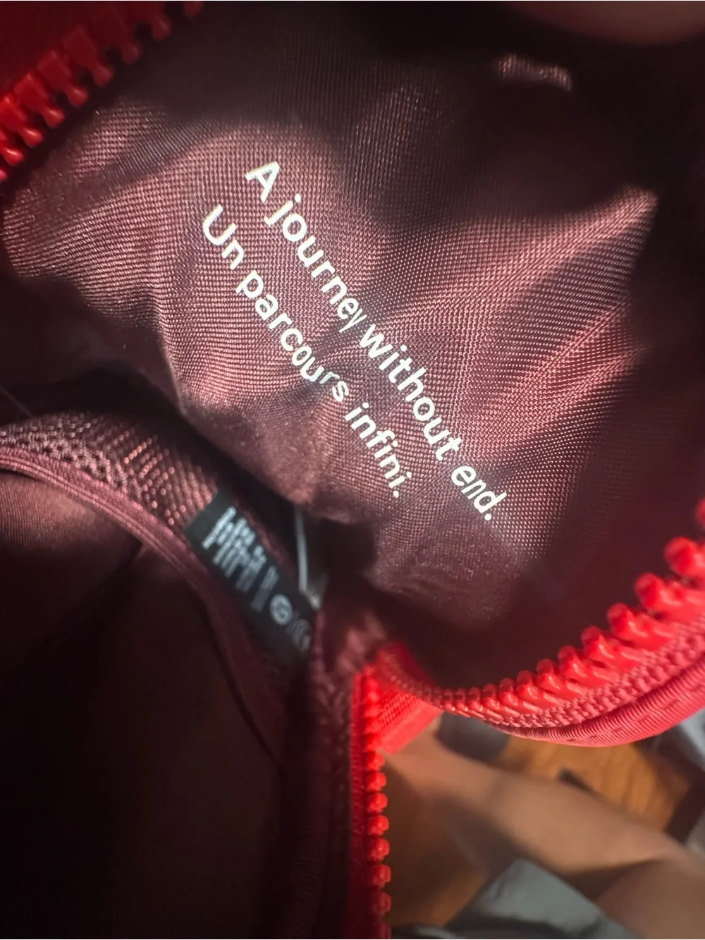 Lululemon Women’s Red Crossbody or belt bag. Zippered, outside phone pocket